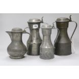 Three 18th century Scottish pewter tappit hens and a pewter lidded baluster jug