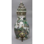 A Chinese famille verte cistern and cover, Kangxi period, damage