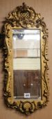 A gilt framed wall mirror, H.82cm