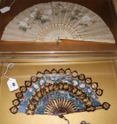 Two Chinese export fans, 19th century, the first a gilt decorated lacquer cabriolet fan, c.1860,