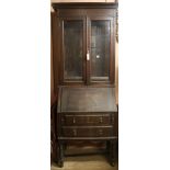 A 1920's oak bureau bookcase, H.207cm