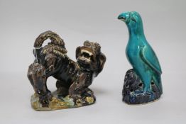 A Chinese model of a parrot and a Shiwan Lion-dog