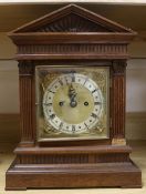 An Edwardian oak twin fusee bracket clock