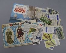 A quantity of cigarette cards, etc