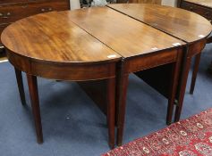 A George III inlaid mahogany D-end dining table, W.167cm with flaps down