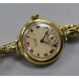 An early 20th century 18ct gold manual wind wrist watch retailed by T.s. Cuthbert, Glasgow, on