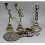 A pair of brass figural candlesticks, opera glasses, plated candlesticks and snuffers and a silver