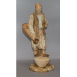 A large Royal Worcester figure of an Arab water carrier