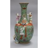 A Chinese green ground 'Boys' vase