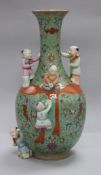 A Chinese green ground 'Boys' vase