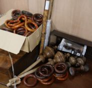 Bamboo curtain poles and fixings, and a quantity of curtain rings, W.185cm