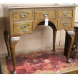 A walnut knee hole desk, W.78cm