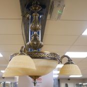 A glass and gilt metal chandelier