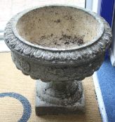 A pair of garden urns, W.48cm