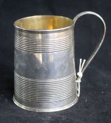 A George III silver christening mug, with reeded handle.