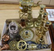 A brass kettle, a miniature copper kettle, brass candlesticks, etc.