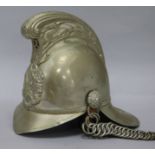 A fireman's helmet and a leather belt