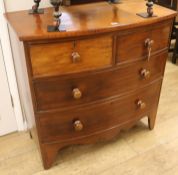 A mahogany bow front chest of drawers, W.92cm