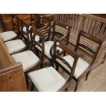 A set of eight Regency style brass inlaid dining chairs (6 + 2)