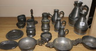 A graduated set of pewter measures, three quaich, miniatures plates, etc.