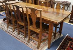 A French fruitwood kitchen table, W.202cm