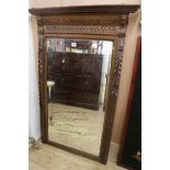 A Flemish style carved oak frame mirror, late 19th century, H.152cm