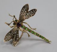 A Victorian gold garnet and diamond set dragonfly brooch, with safety chain, 48mm.