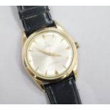 A gentleman's gold plated and steel Tudor Oysterthin manual wind wrist watch, (loose winding