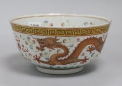 A Chinese enamelled porcelain 'dragon ' bowl, Kangxi mark, early 20th Century, cracked