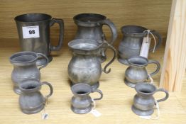 A collection twelve various 18th / 19th century pewter tankards