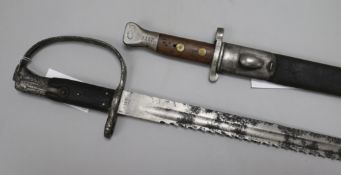 Two War Department bayonets, an 1888 pattern, the blade stamped WD below broad arrow and dated '96