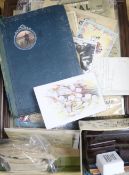 A collection of ephemera to include postcards, cigarette cards, etc.