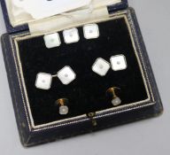 A cased set of 9ct gold mother of pearl and split pearl cufflinks and matching dress studs