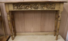 A pine carved hall table and a two tier whatnot, W.110cm and W.40cm