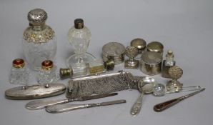 A quantity of silver mounted dressing table items, including a rock crystal glass scent bottle, 11.