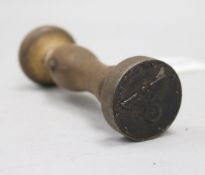 A German WWII document stamp with turned wood handle