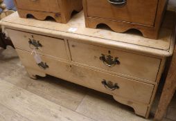 A pine three drawer low chest, W.104cm