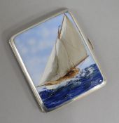 A silver and enamel cigarette case, Birmingham 1932, possibly later enamelled with a sailing