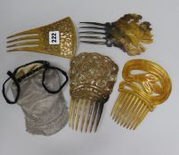 A silver and mesh purse and tortoiseshell combs