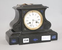 A black slate mantel clock