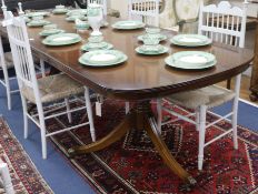 A mahogany extending pedestal dining table, with two leaves, W.260cm with both leaves