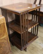 An inlaid rosewood revolving bookcase, H.90cm