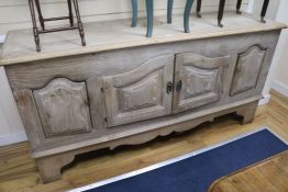 A limed oak dining room sideboard, W.185cm