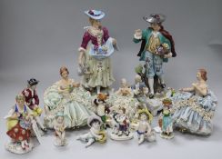 A pair of modern porcelain figures of gardeners, three Capodimonte lace figures and eight other