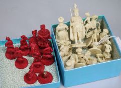 A part set of Chinese red lined natural carved ivory chess set