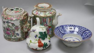 Two Chinese teapots, a bowl and an ornament