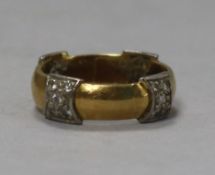 A diamond set gold band, unmarked, 7.7g gross