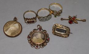 Mixed gold jewellery; an 18ct gold and diamond ring, a gem set ring stamped 750, a 9ct pearl and