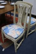 A pair of cream painted side chairs