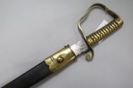 An 1856 pattern saw back Pioneer sword, stamped WD, 43W?, brass mounted flexible leather scabbard